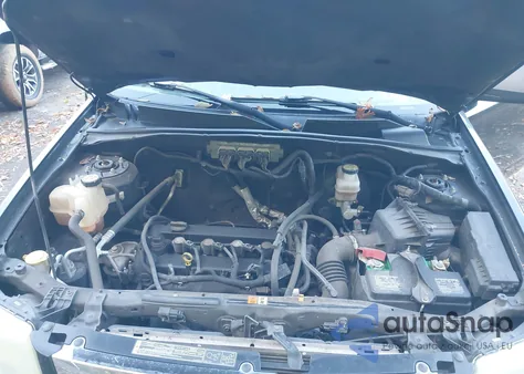 2010 Mazda Tribute I Sport из США, поврежденный, VIN 4F2CY0C70AKM00127